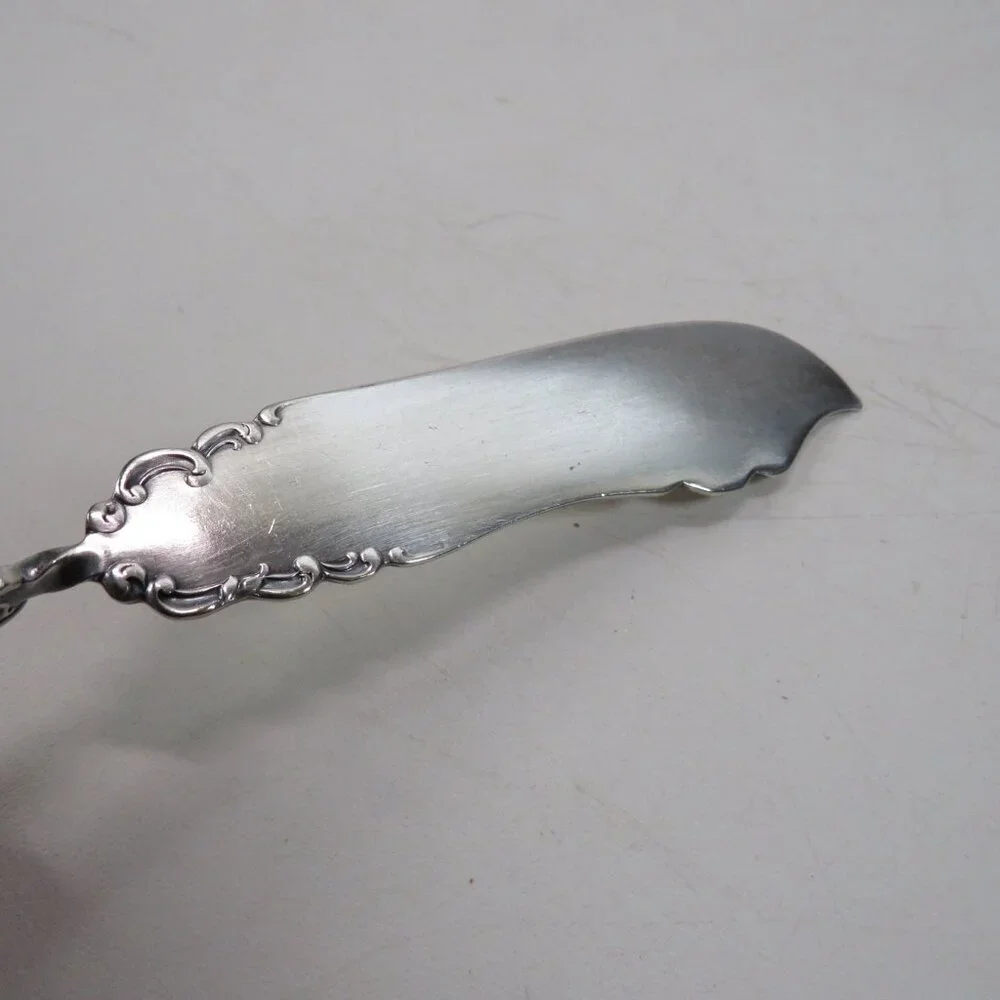 Webster Twisted Handle Butter Knife silver plated S.L. & G.H. Rogers Company A1